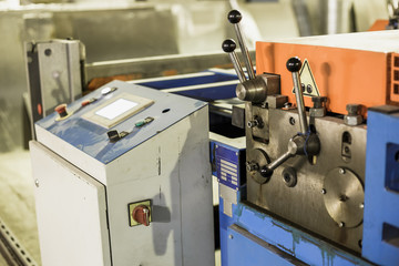 Factory manufacturing of modern metalworking production of industrial steel ventilation air systems, close up of workshop with tools equipment