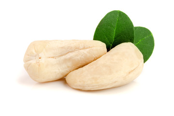 cashew nuts with leaf isolated on white background. macro