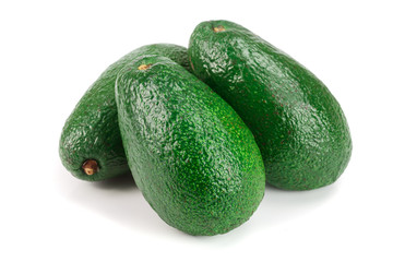 whole avocado isolated on white background close-up