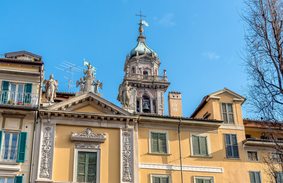 View of Bell tower of Bernascone and ancient building in Varese, Italy 
