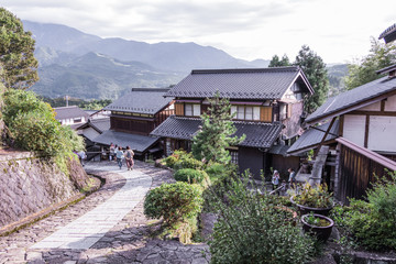 Fototapeta na wymiar MAGOME, JAPAN - SEPTEMBER 18, 2017: The old town or old buildings of Magome for the travelers walking at old street in Nagano Prefecture, JAPAN.
