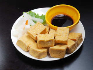 Deep fried tofu with sweet and soy sauce