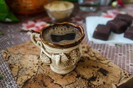Coffee in a beautiful Cup and sweets