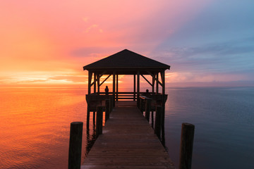Peaceful and colorful Sunset from pier overwater