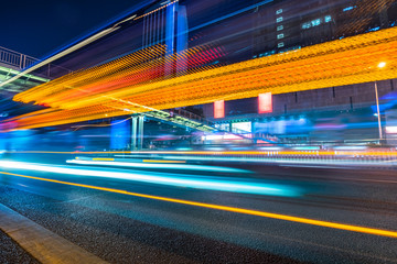 traffic with blur light through city at night.