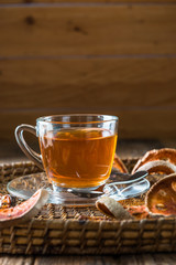 Bael tea juice on wooden table , healthy drink