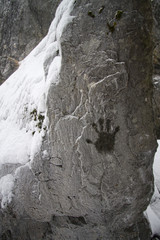 Frozen Hand print on Stone wall