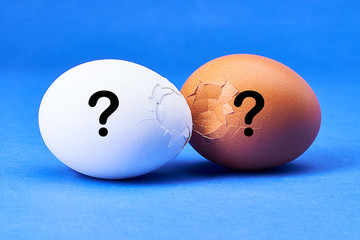 Broken eggs at the blue background