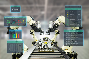 iot industry 4.0 concept.Smart factory using automation robotic arms with augmented mixed virtual...