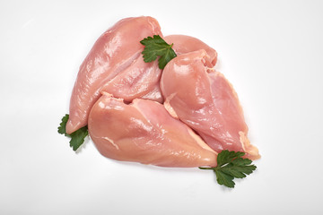 Raw chicken breast fillets isolated on white background
