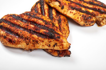 Chicken meat. Grilled fillet pieces isolated on white background.