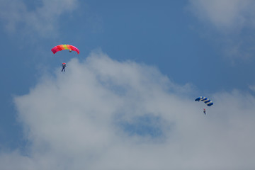 Fototapeta na wymiar parachute./Under the clouds.
