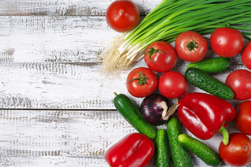 Assorted vegetables on white wood