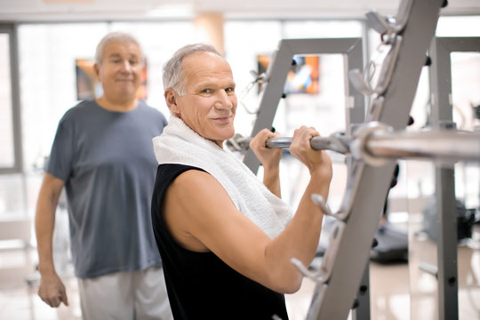Elderly people in modern gym