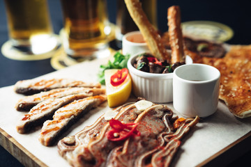 fried appetizer beer sidedish on cutting board