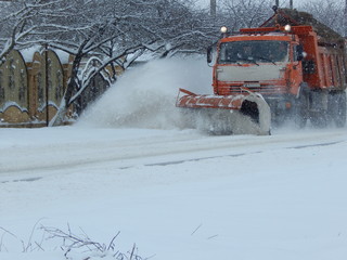 A look at the snow-removing machine that cleans the Lenin street of the village of Nezlobnaya,...