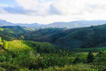 Fototapeta na wymiar Landscape of natural layer mountains range in sunlight