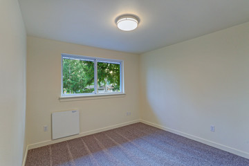 Fototapeta premium Empty room interior with milky walls and carpet floor.