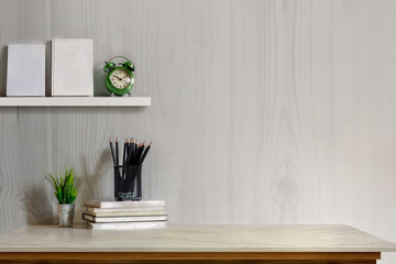 Mock up desk top concept, Workspace with office supplies , books on white marble table.