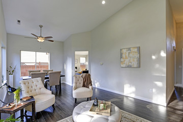 Sun filled family room in soft beige tones.
