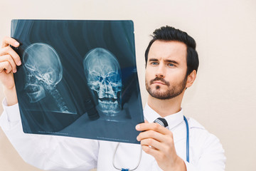 Doctor looking at x-ray photo  in hospital.healthcare and medicine