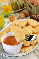 Fried chicken nuggets on the fork