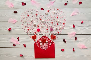 st Valentine's red envelope with a message of hearts and candies