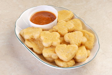 Fried chicken nuggets on a plate    