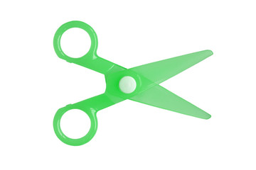 Green Plastic children safety scissors isolated on white background.
