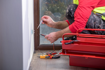 professional electrician at work
