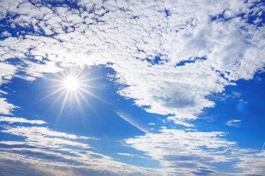 Summer Landscape From Blue Sky And Sun With White Clouds