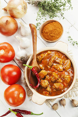 Meat stew in tomato sauce