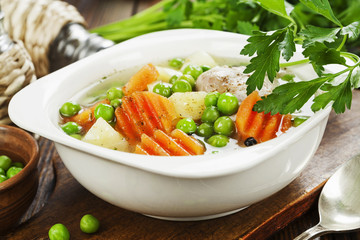 Chicken soup with green peas