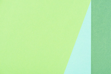 close-up shot of paper layers of green and blue shades for background