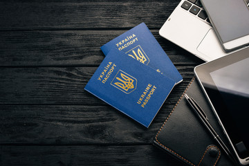 Business concept, American dollars, glasses, passport of a citizen of ukraine. Top view. Free space...
