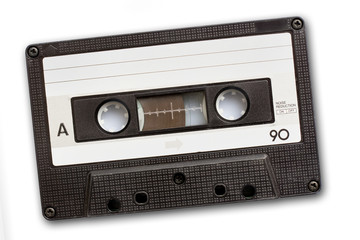 Audio cassette tape isolated on white background, vintage 80s music concept