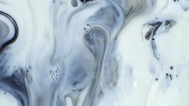 Abstract patterns of ink on water