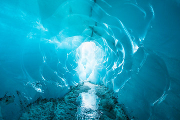 Blue crystal ice cave at Solheimajokull glacier - obrazy, fototapety, plakaty