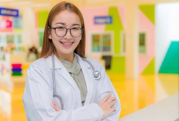 Portrait of Medical physician doctor woman with stethoscope in hospital