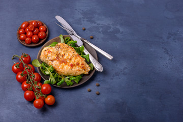 Fried fillet chicken and tomatoes