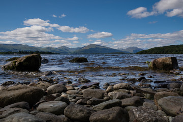 Fototapeta na wymiar The rocky Loch Lomond beach