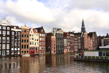 Obraz premium Houses in Damrak district, Amsterdam, Netherlands