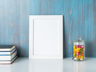 mock up frame on blue wooden wall