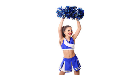 Young cheerleader in blue and white suit with pompoms on white background. Isolated on white...