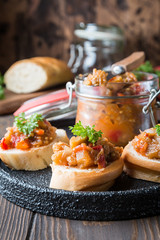 Bread toasts with eggplant caviar.