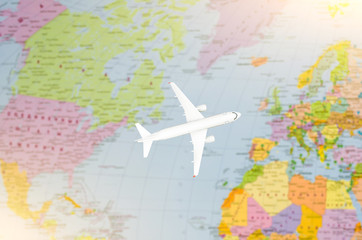 Obraz na płótnie Canvas Flight to Europe symbolic image of travel by plane map