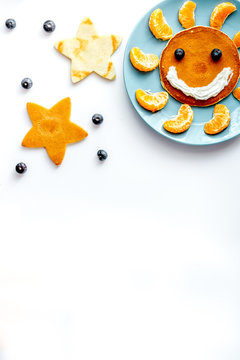 Concept Kid Breakfast With Pancake Top View On White Background