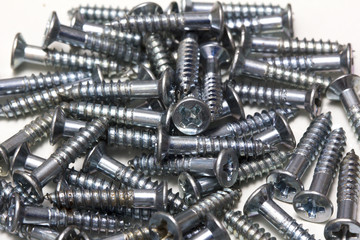 Close-up on screws, metal screws, iron screws, wood screws