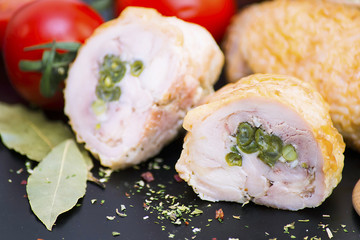 meatloaf with asparagus inside on a table