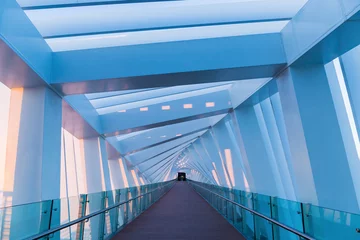 Zelfklevend Fotobehang Pedestrian gallery inside the bridge on a Dubai Water Canal © arbalest
